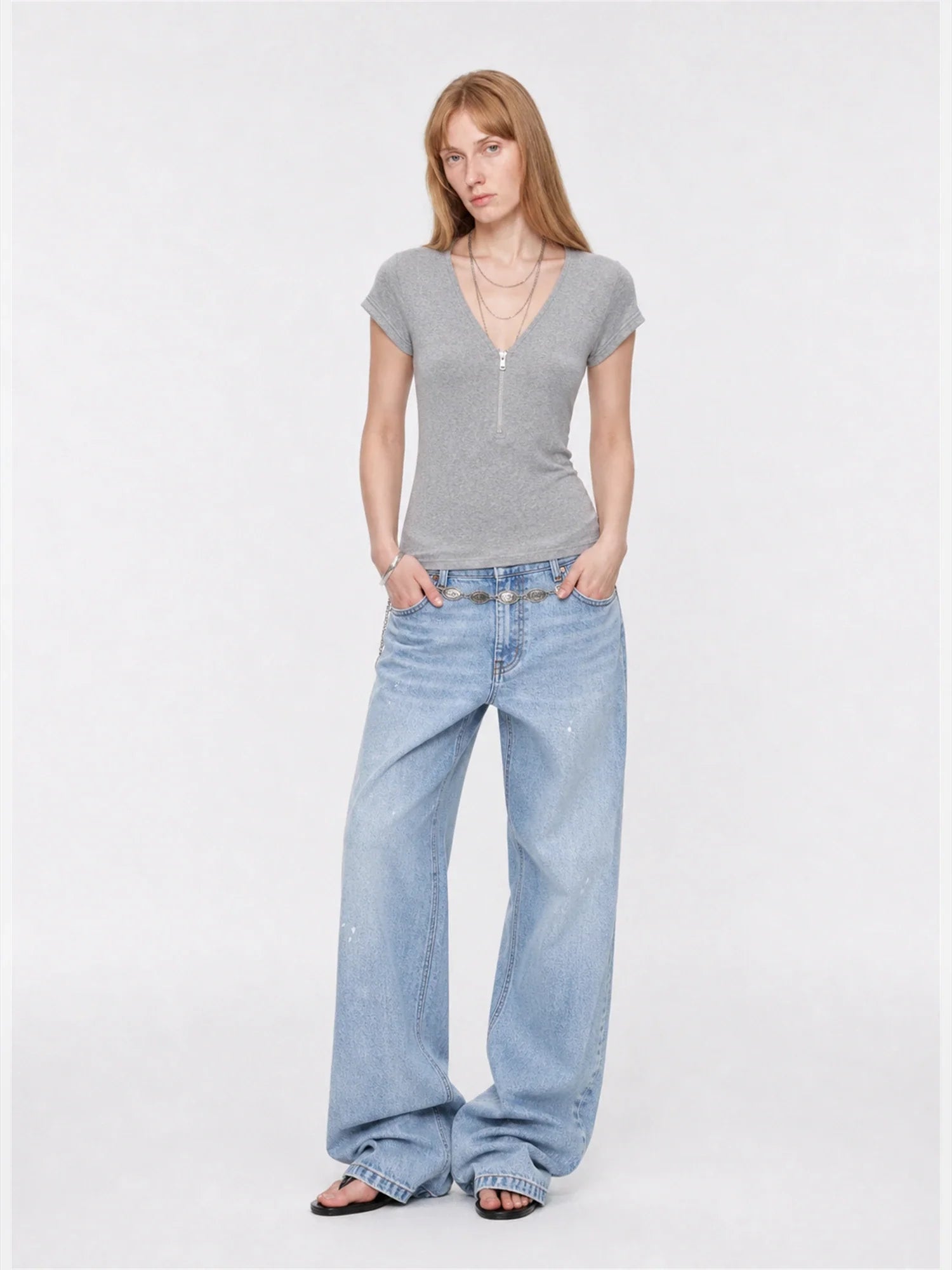 Khaki Gray merino wool Tencel deep V-neck zipper short sleeve top on model full front view