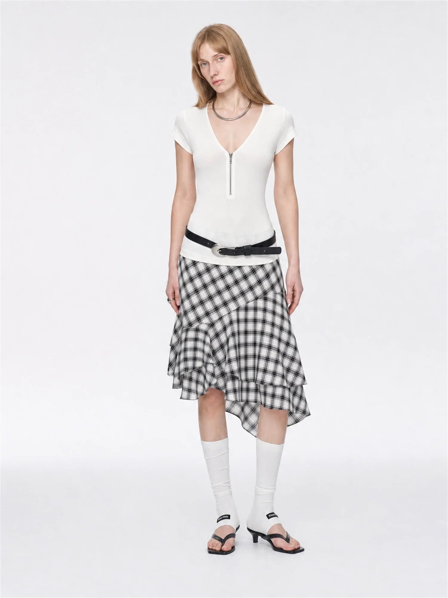 Original White merino wool Tencel deep V-neck zipper short sleeve top on model full front view