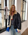Speedy Flow blue motorcycle shearling jacket window styling view