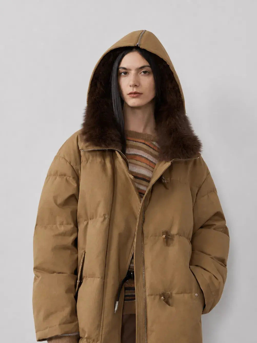Model wearing Fireladyfur Street Badge Yellow Brown hooded down parka with fox fur trim front view