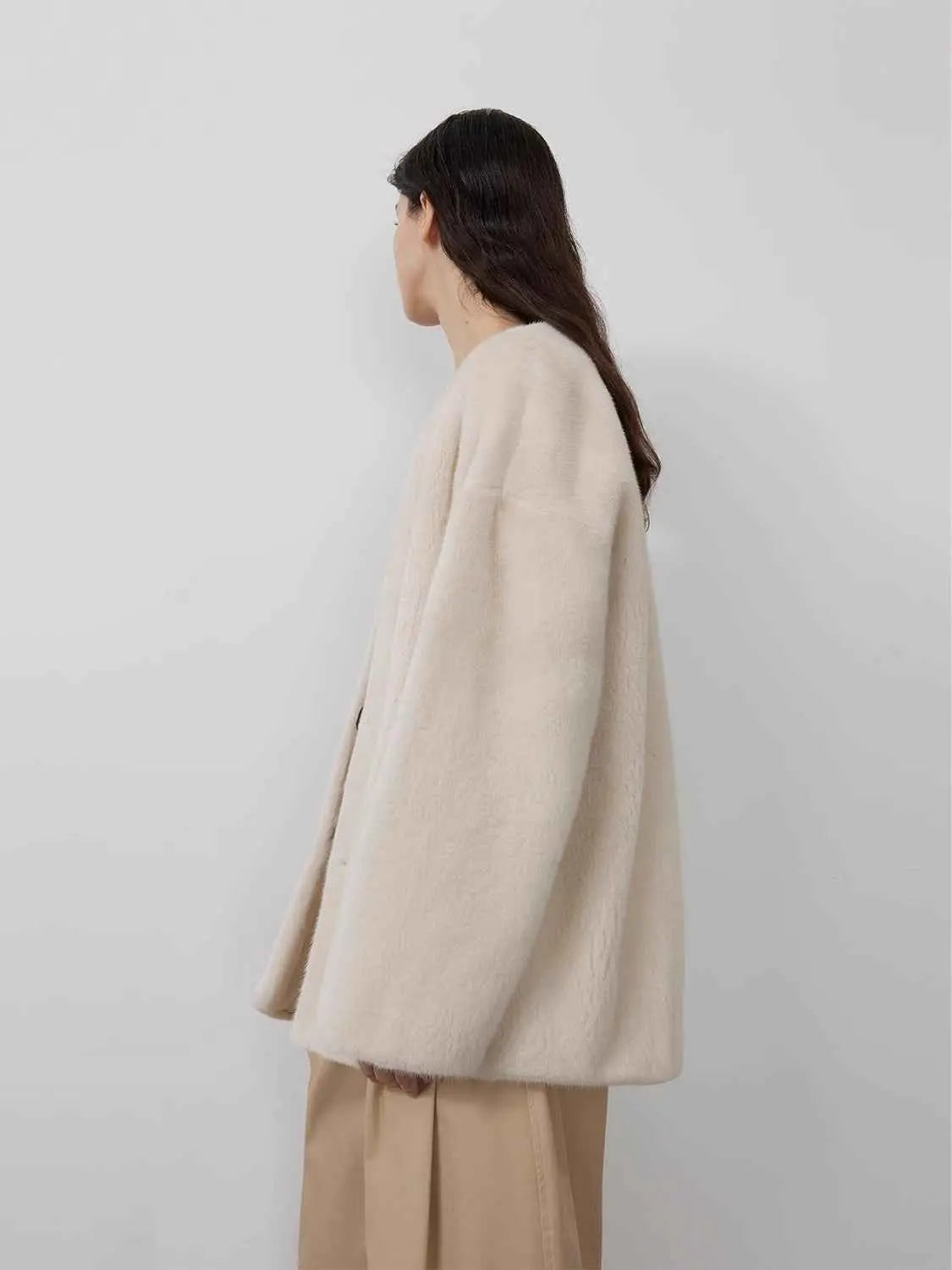 Swiss Snow Pearl Beige mink coat on model, side and back view