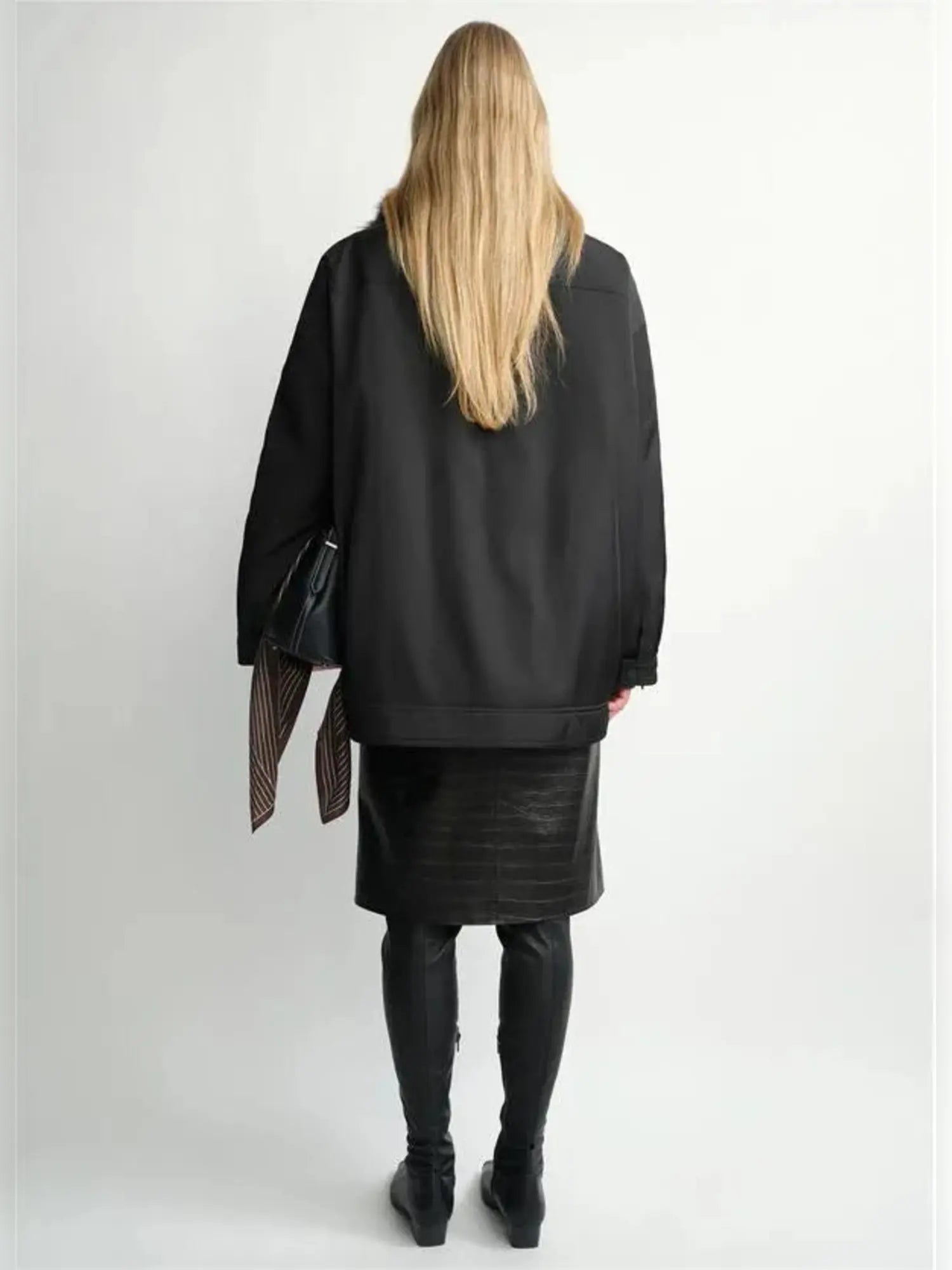 THE ARTM women's Black detachable fur collar nylon down parka back view on model
