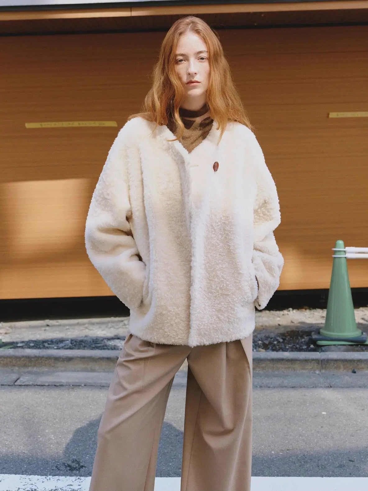 Urban Home off-white Merino shearling coat street style model view