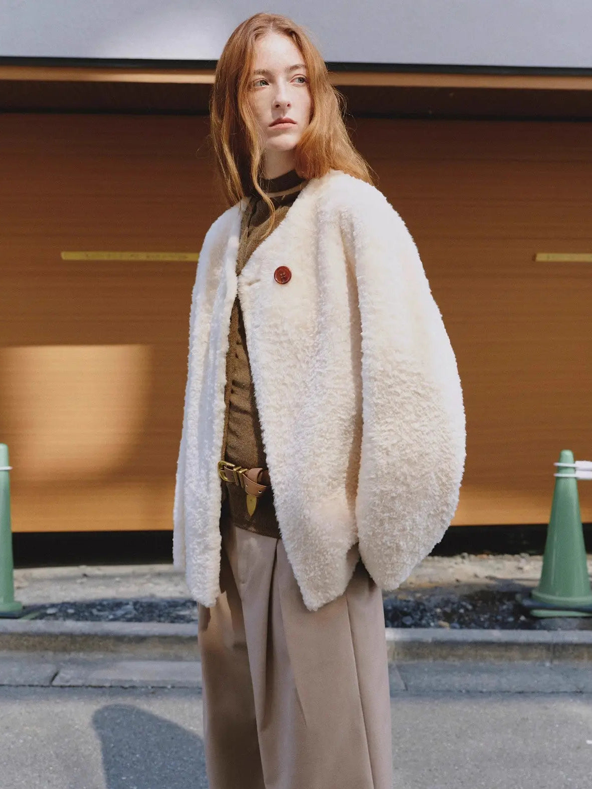 Urban Home off-white sweetheart neckline shearling coat side street view