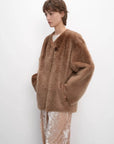 Urban Home chestnut shell Merino shearling coat side model view