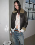 Vintage Reverie crackled brown shearling jacket styled with denim