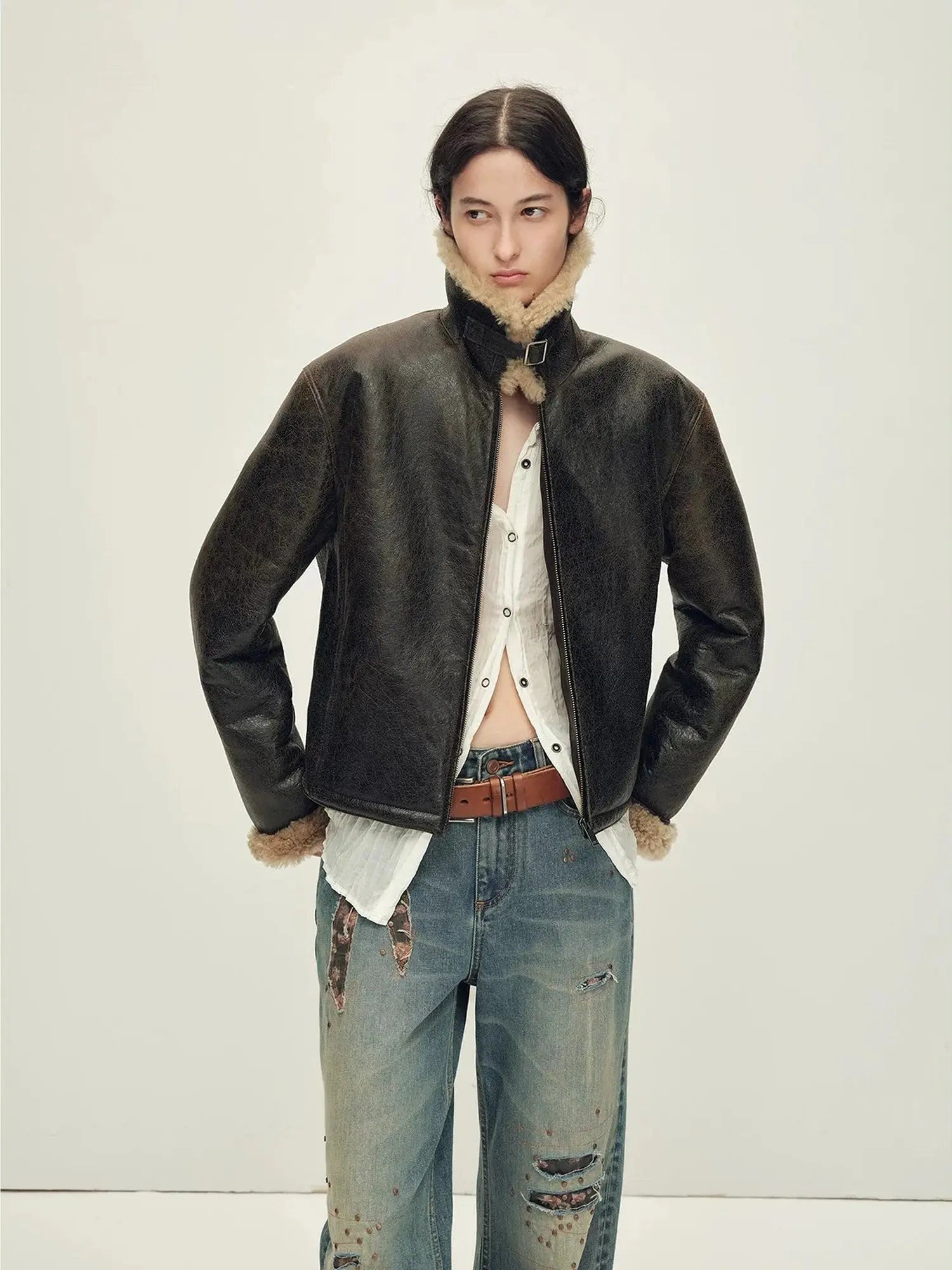 Woman styling the Vintage Reverie shearling jacket with raised collar