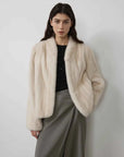 Warm Coffee Pearl Beige short mink jacket on model