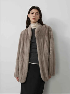 Warm Coffee Sapphire long mink jacket on model