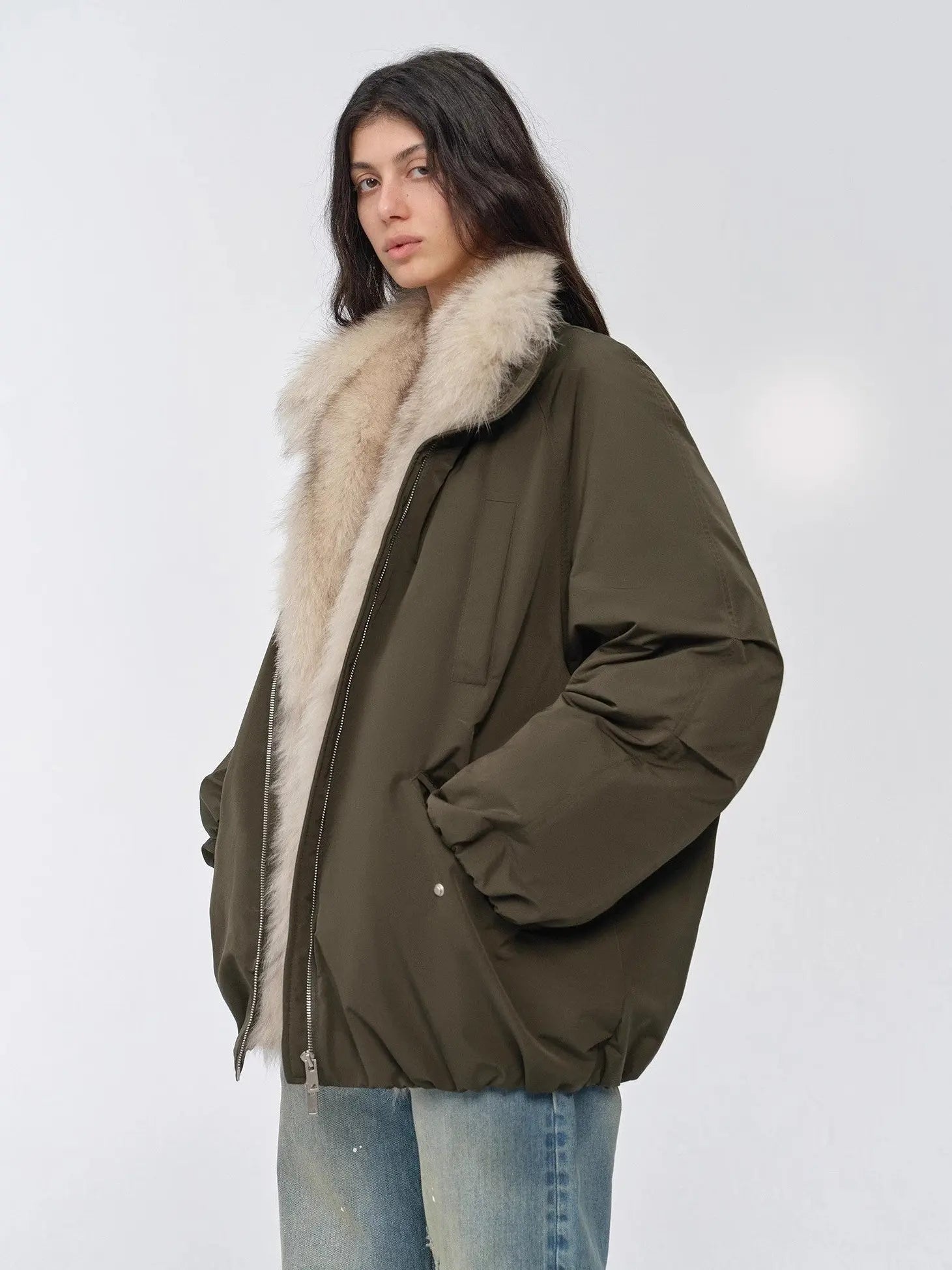 Model wearing Fireladyfur Warm Dialogue Army Green two-tone fox fur down parka open front