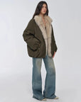 Full-length three-quarter view of Fireladyfur Warm Dialogue Army Green fox fur down parka