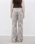 "Wilful Zebra" custom zebra print yeast stone washed low waist flared jeans for women - variant_title