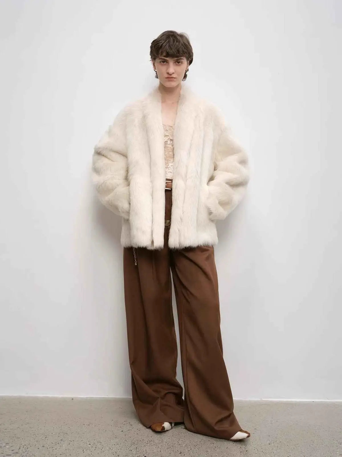 Winter Love Island off-white long lapel shearling coat full-length model view