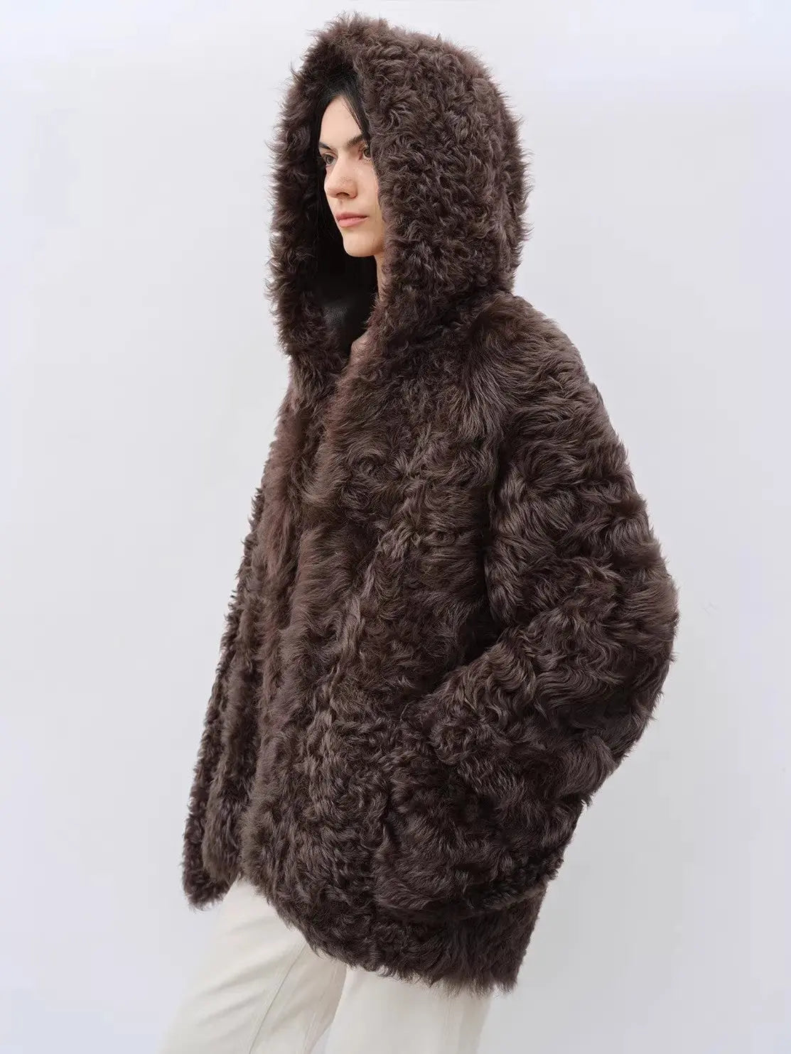 Winter Snow brown curly shearling coat with hood up, side view