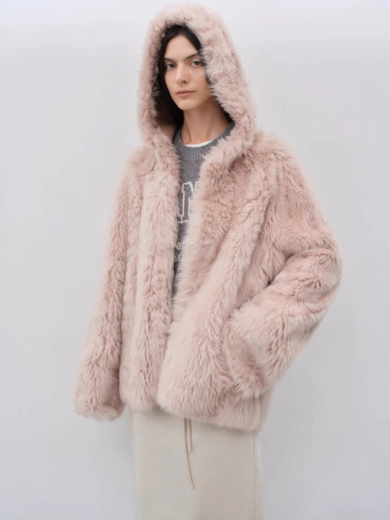 Winter Snow dirty pink curly shearling coat with hood up, close front view