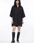 Black oversized paneled pullover shirt on model
