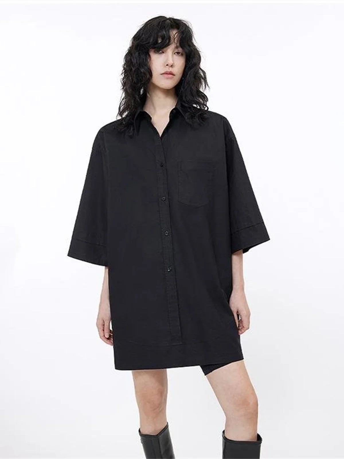 Black paneled pullover shirt side view