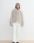 Model wearing the Yorta morning cloud gray Toscana shearling jacket