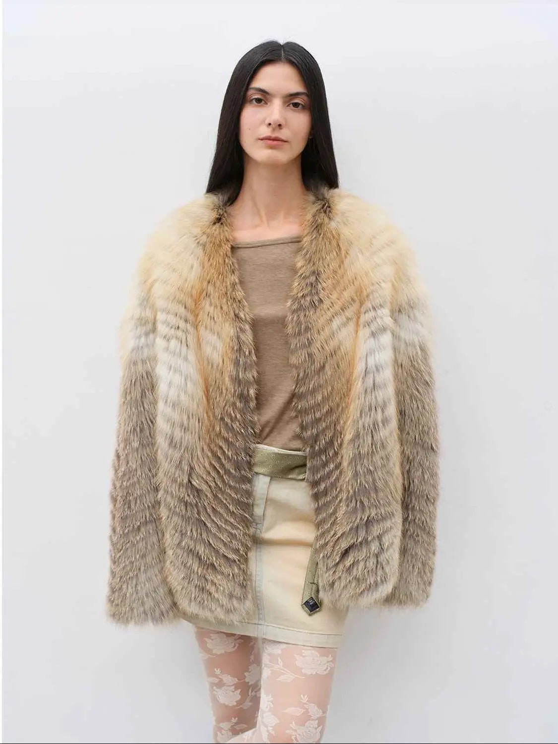 Model wearing Yukino Dream Golden Island Fox natural color coat, front view