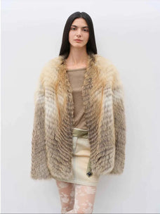 Model wearing Yukino Dream Golden Island Fox natural color coat, front view