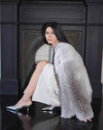 Yukino Dream Sunlight Fox natural color long coat, seated model view